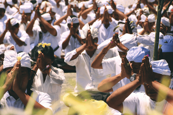 people praying in bali temples